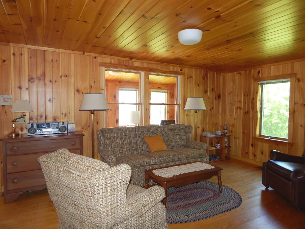 151 Lake Road Robbinston, ME 04671 - Photo 17 of 30 Comfortable living room with water...
