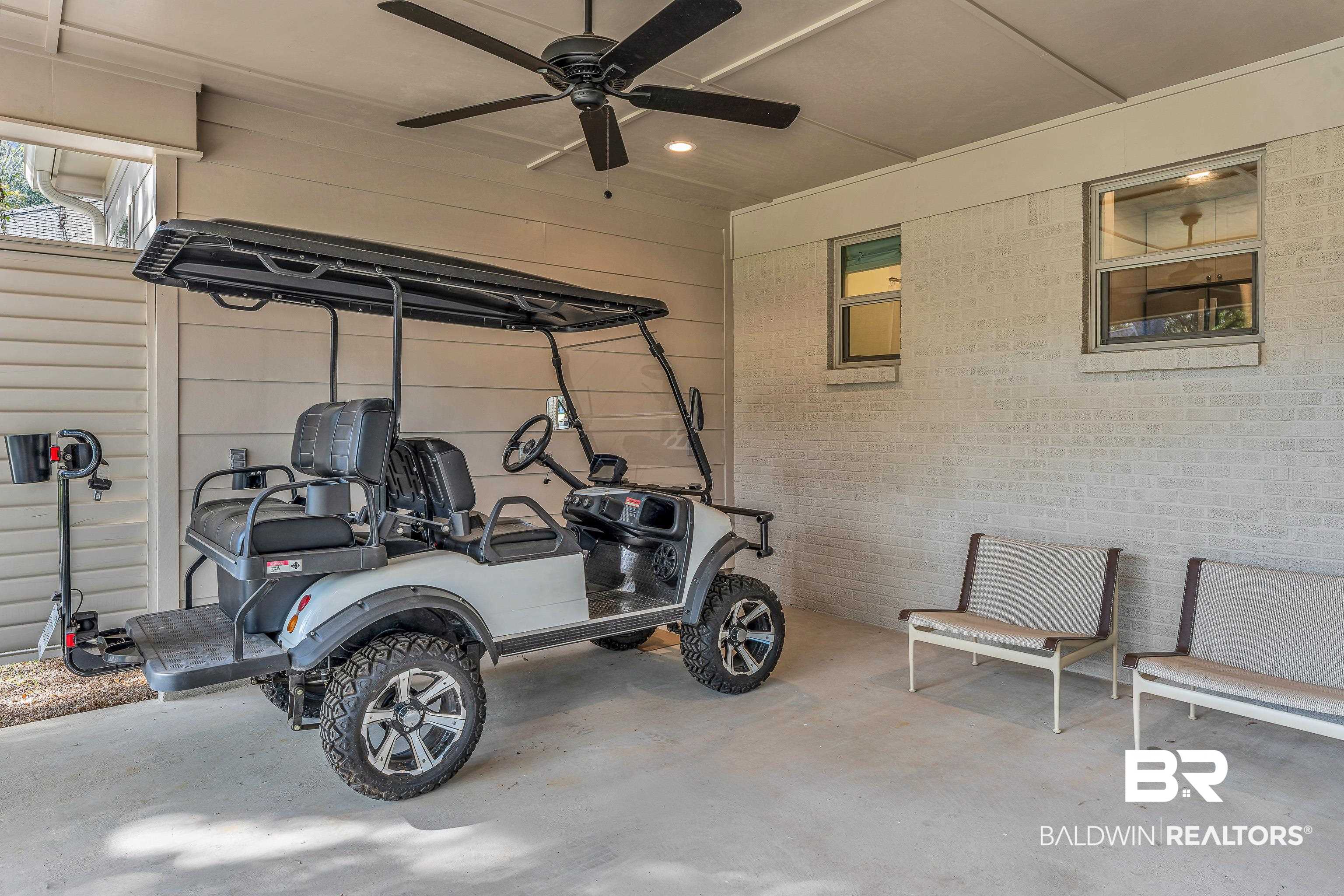 357 Azalea Street Fairhope, AL 36532 - Photo 19 of 22 Garage with a ceiling fan