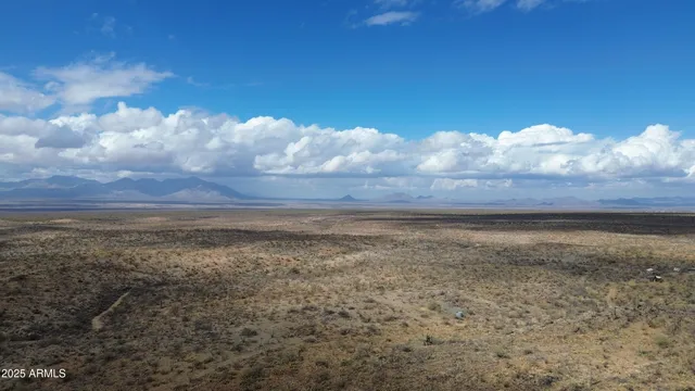 a view of an outdoor space and mountains