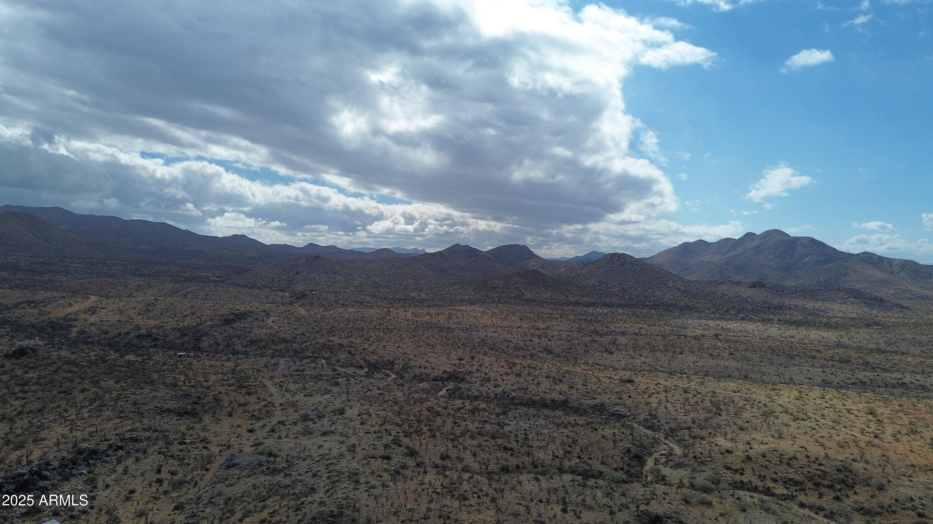 20-acres South Garvey Road Tucson, AZ 85736 - Photo 15 of 17 a view of an outdoor space and mountains