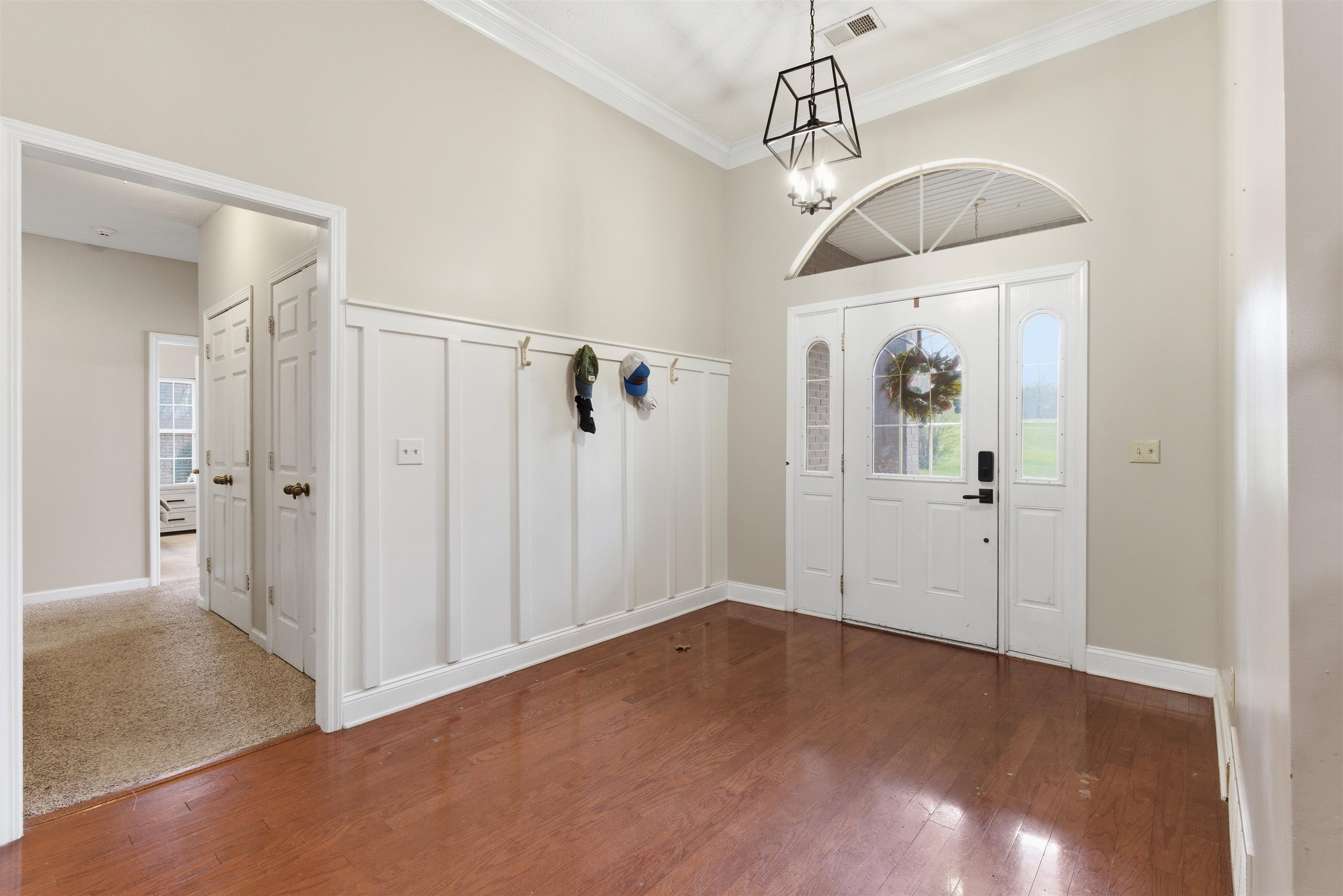 915 Cliffview Road Bolivar, TN 38008 - Photo 5 of 35 a view of a room with wooden floor and white walls