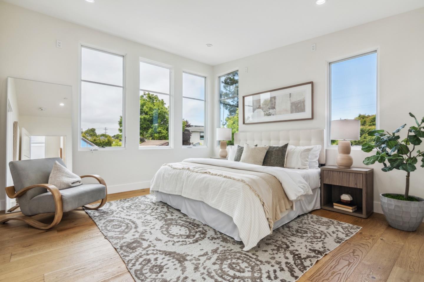 910 Cedar Street Berkeley, CA 94710 - Photo 20 of 39 a bed room with a bed and a couch