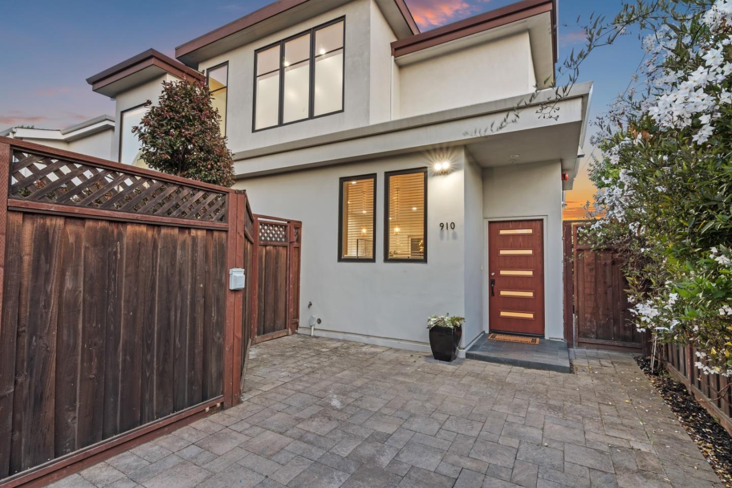 910 Cedar Street Berkeley, CA 94710 - Photo 2 of 39 a view of a house with a barbeque and wooden stairs