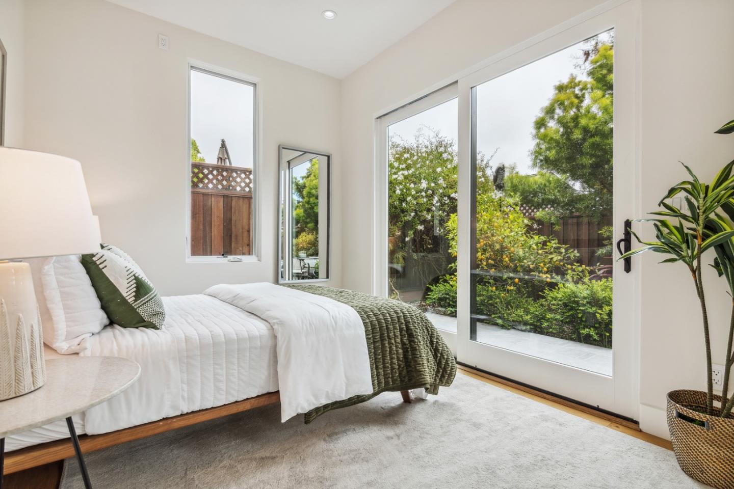 910 Cedar Street Berkeley, CA 94710 - Photo 29 of 39 a bedroom with a bed and a window