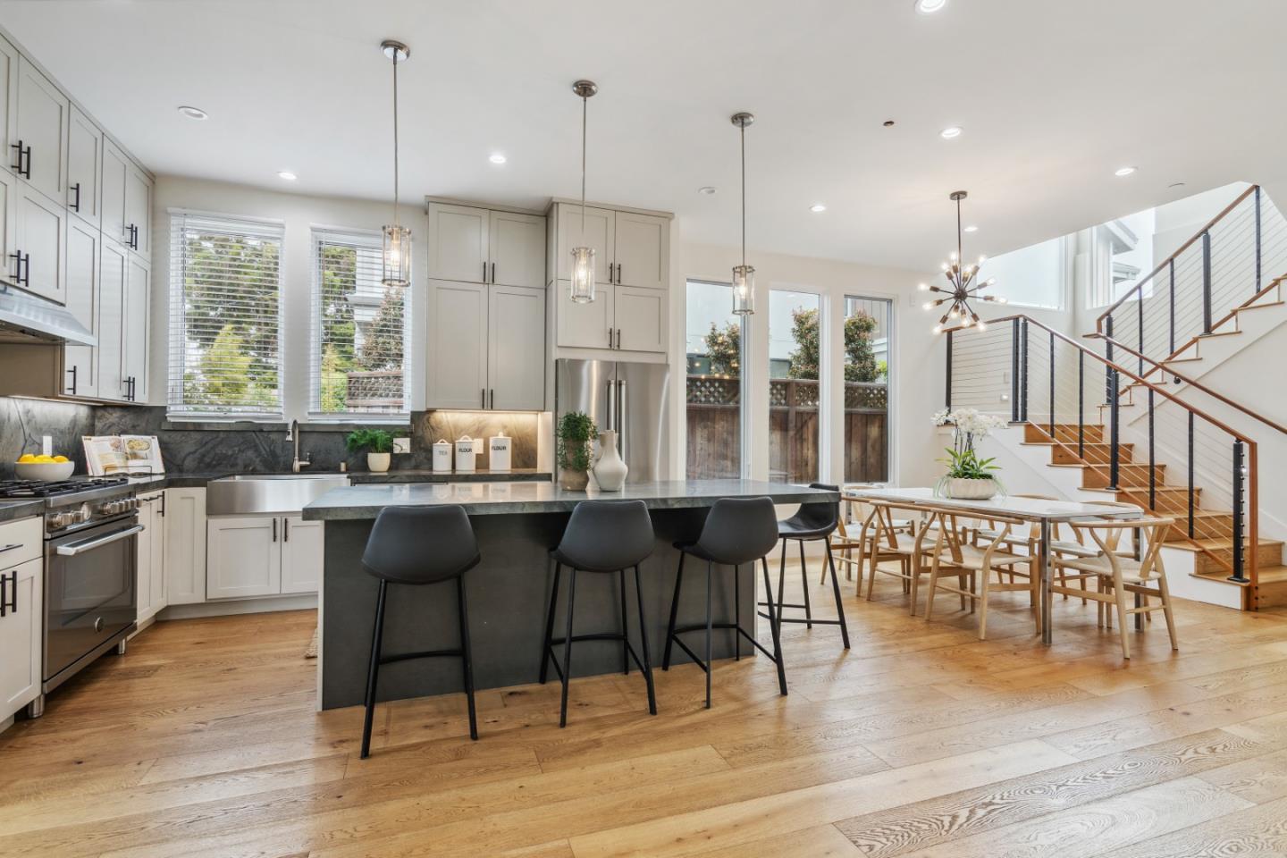 910 Cedar Street Berkeley, CA 94710 - Photo 35 of 39 a large kitchen with a table and chairs