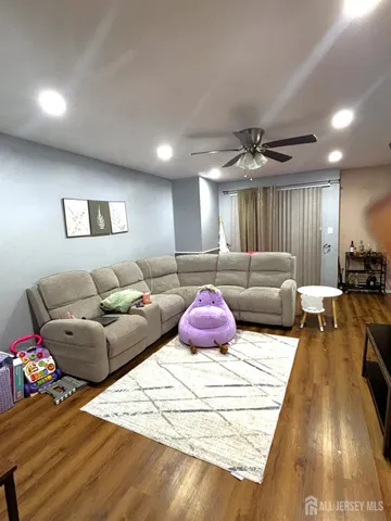 a bedroom with furniture and a chandelier