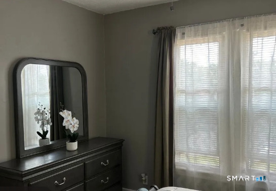 158 North Main Street Ansonia, CT 06401 - Photo 12 of 20 a front view of a dining room with a front door