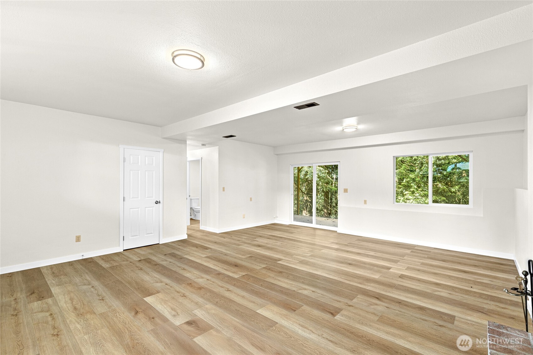 12718 Southeast 184th Place Renton, WA 98058 - Photo 27 of 34 a view of an empty room with a window