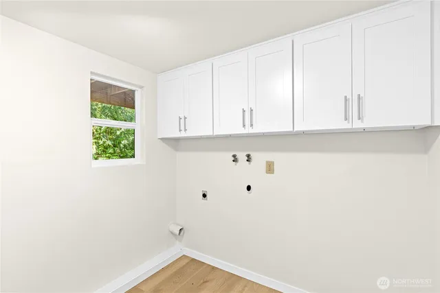 a view of cabinets and window