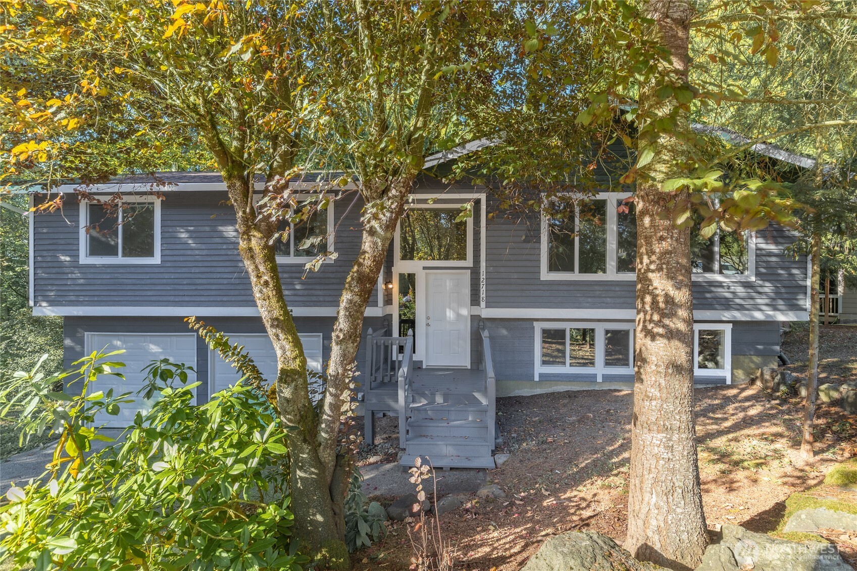 12718 Southeast 184th Place Renton, WA 98058 - Photo 3 of 34 front view of a house with a tree