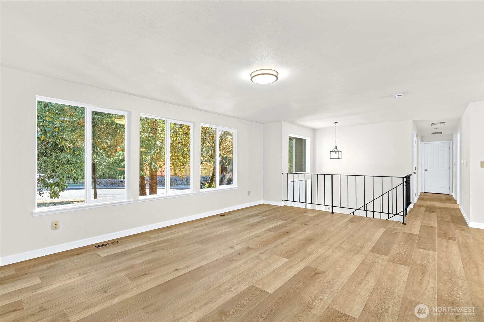 12718 Southeast 184th Place Renton, WA 98058 - Photo 8 of 34 a view of an empty room with a window