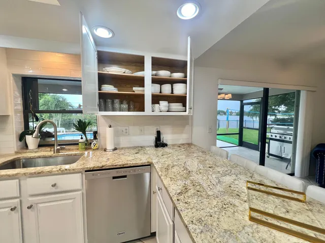 a view of an outdoor space and deck having patio