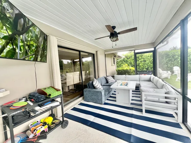a kitchen with a large window