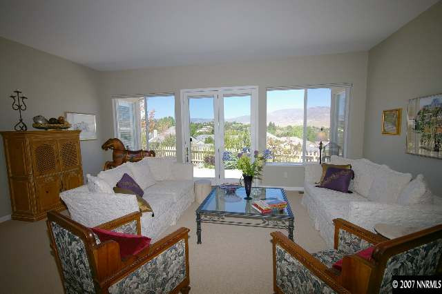1865 Hunter Creek Road Reno, NV 89519 - Photo 3 of 9 a living room with furniture and a window
