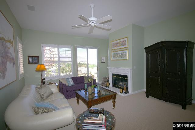 1865 Hunter Creek Road Reno, NV 89519 - Photo 5 of 9 a living room with furniture and a fireplace