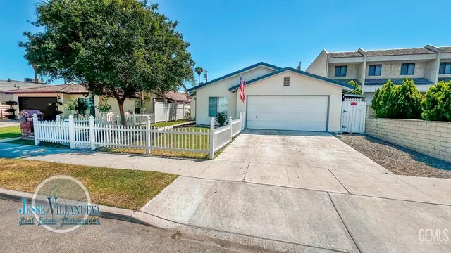 a front view of a house with a outdoor space