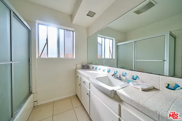 a utility room with a window dryer and washer