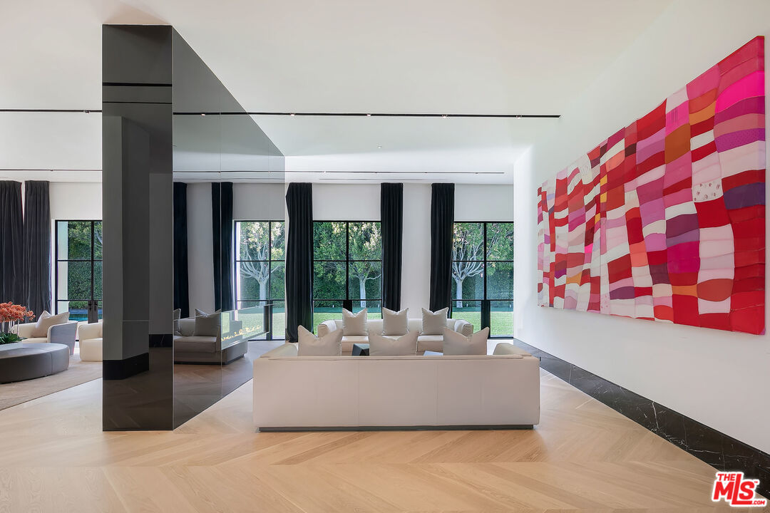 10701 Bellagio Road Los Angeles, CA 90077 - Photo 9 of 36 a living room with large window