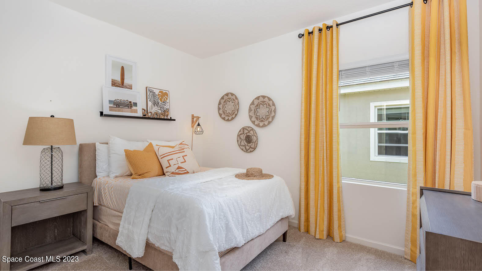 3356 Morrow Place Mims, FL 32754 - Photo 14 of 43 a bedroom with a bed and a window