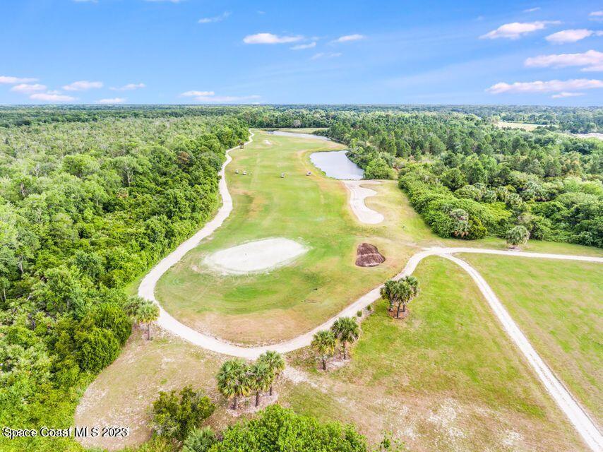 3356 Morrow Place Mims, FL 32754 - Photo 31 of 43 a view of a swimming pool with a yard
