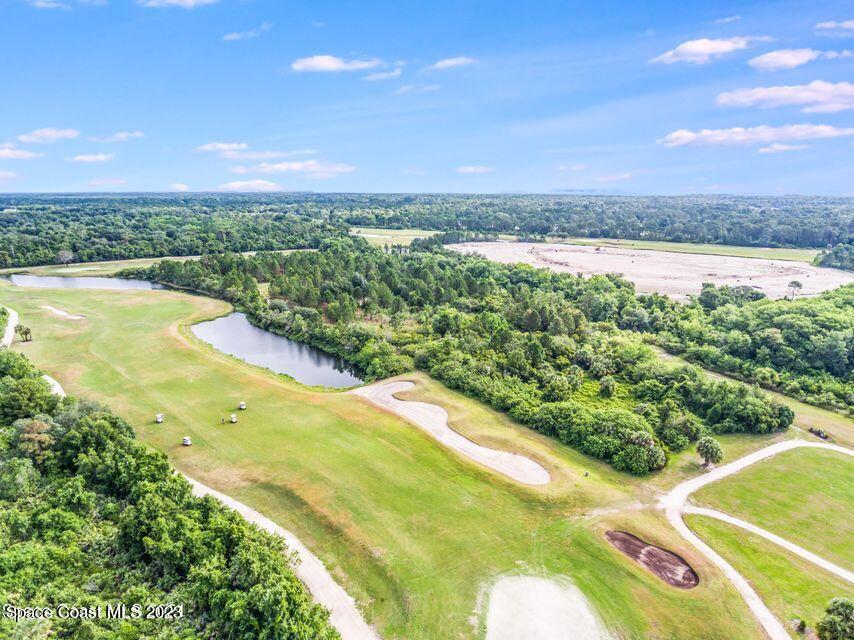 3356 Morrow Place Mims, FL 32754 - Photo 32 of 43 a view of a city and mountains in the background