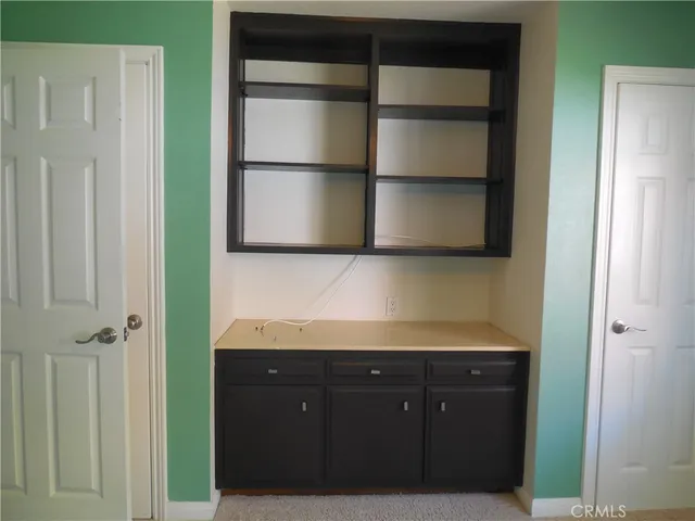a bathroom with a sink and a cabinet