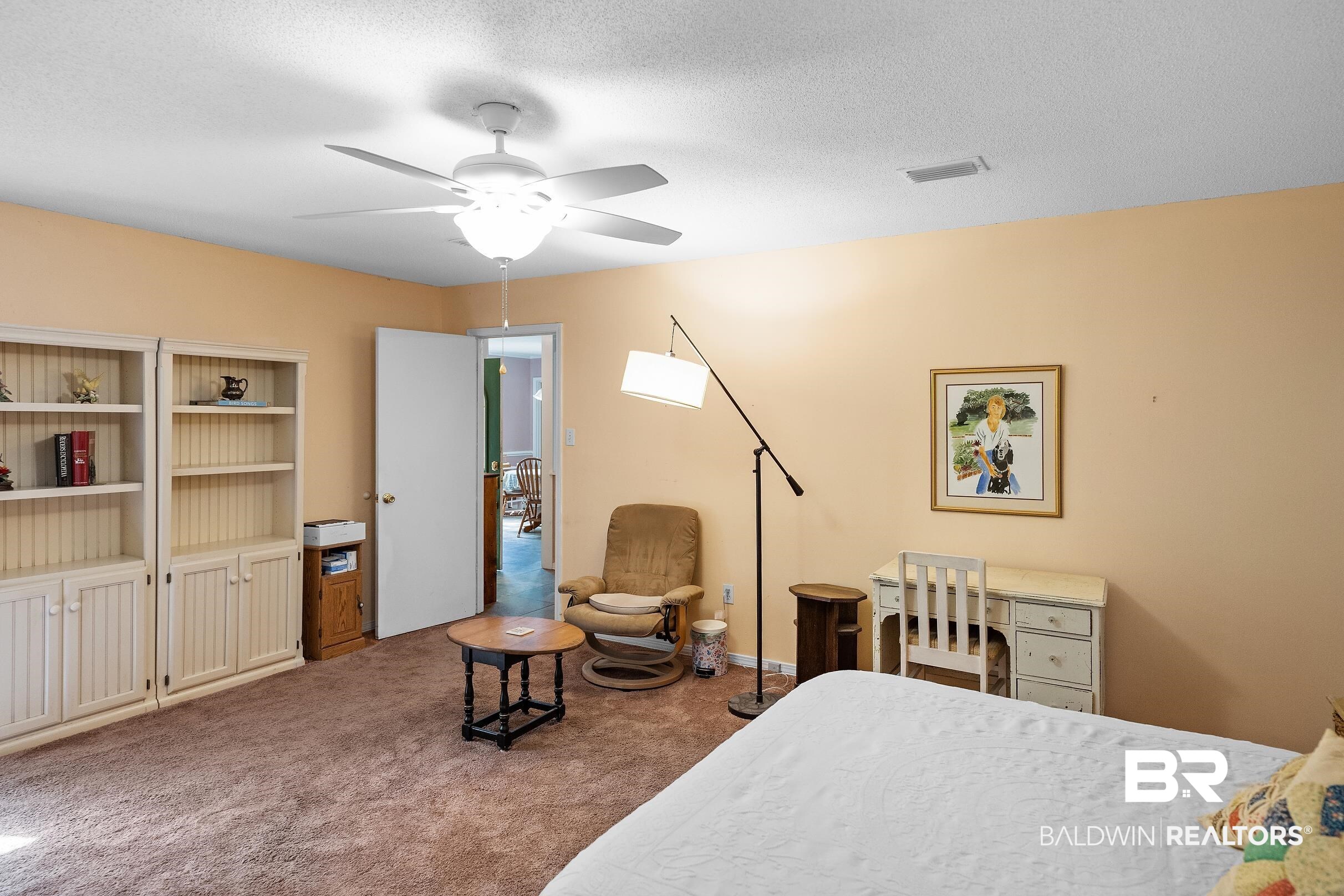 4026 Kingsrow Row Mobile, AL 36619 - Photo 25 of 51 Carpeted bedroom featuring a textured ceiling and a ceiling fan