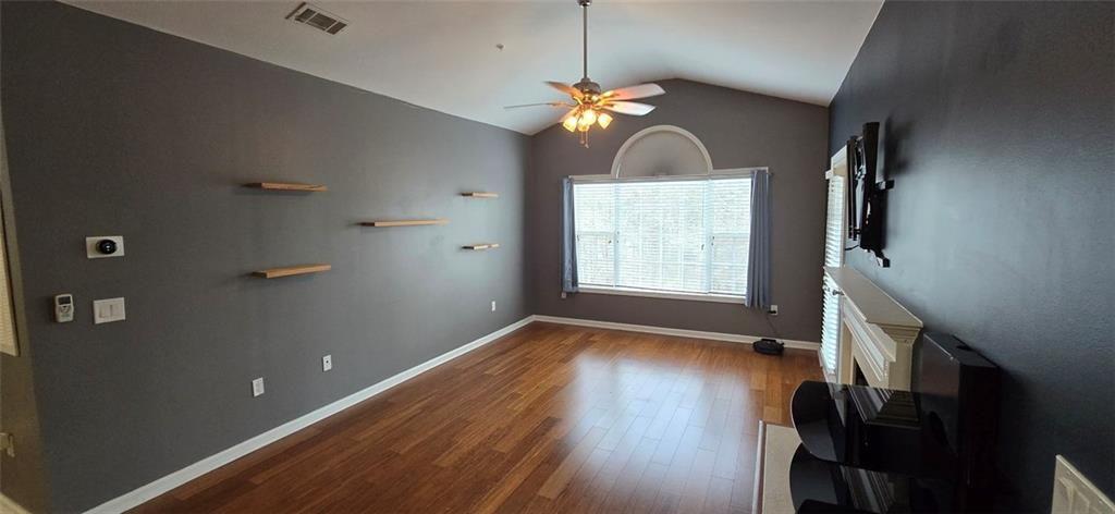3500 Sweetwater Road, Unit 225 Duluth, GA 30096 - Photo 23 of 34 a view of livingroom with hardwood floor and hallway