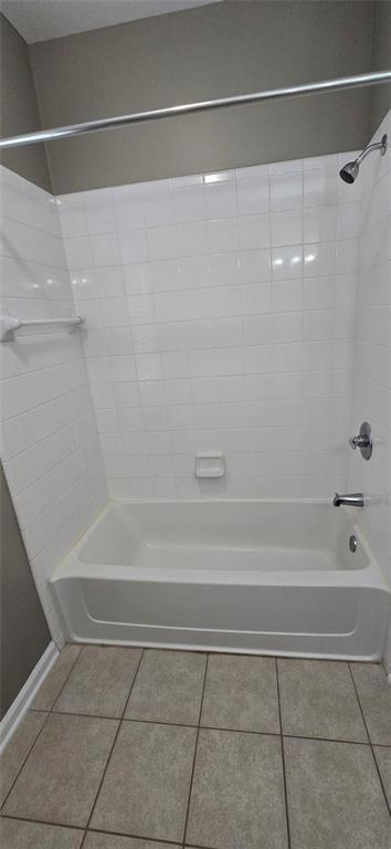 3500 Sweetwater Road, Unit 225 Duluth, GA 30096 - Photo 26 of 34 a bathroom with a shower and a bath tub