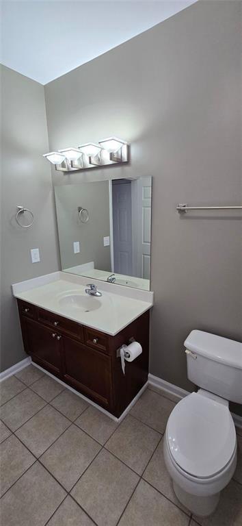 3500 Sweetwater Road, Unit 225 Duluth, GA 30096 - Photo 27 of 34 a bathroom with a sink a toilet and a mirror