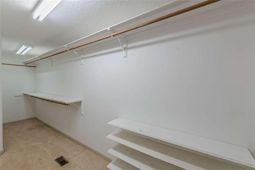 1380 Elliott Road McDonough, GA 30252 - Photo 16 of 33 a bathroom with a sink and shower