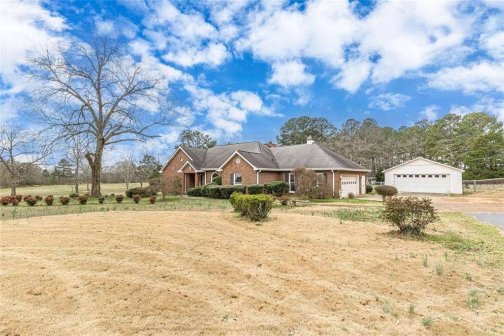 1380 Elliott Road McDonough, GA 30252 - Photo 2 of 33 a view of a house with a yard