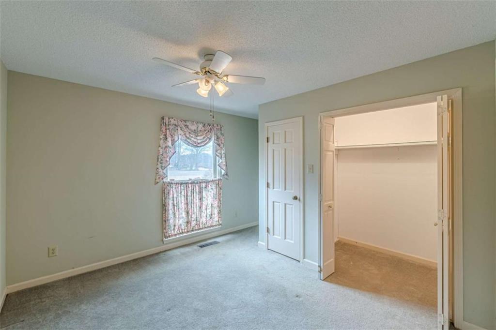 1380 Elliott Road McDonough, GA 30252 - Photo 22 of 33 a view of an empty room with a window