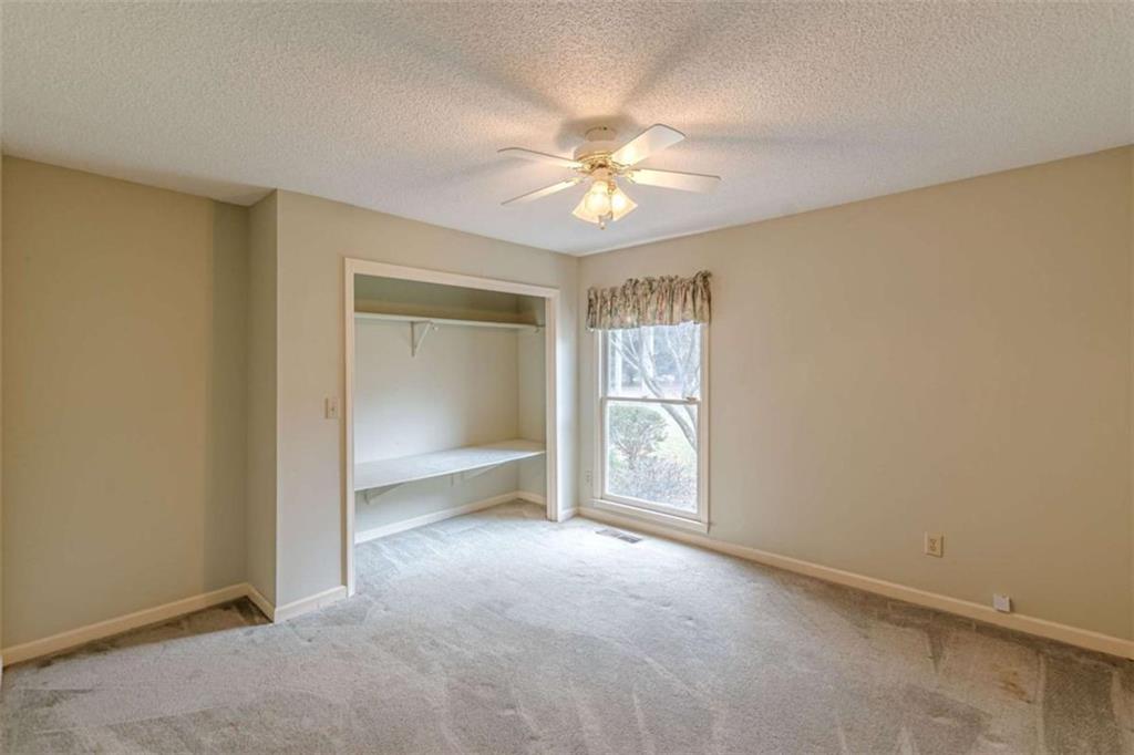 1380 Elliott Road McDonough, GA 30252 - Photo 23 of 33 a view of an empty room with a window