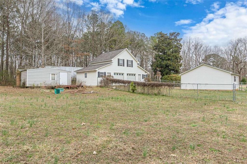 1380 Elliott Road McDonough, GA 30252 - Photo 25 of 33 a front view of a house with a yard