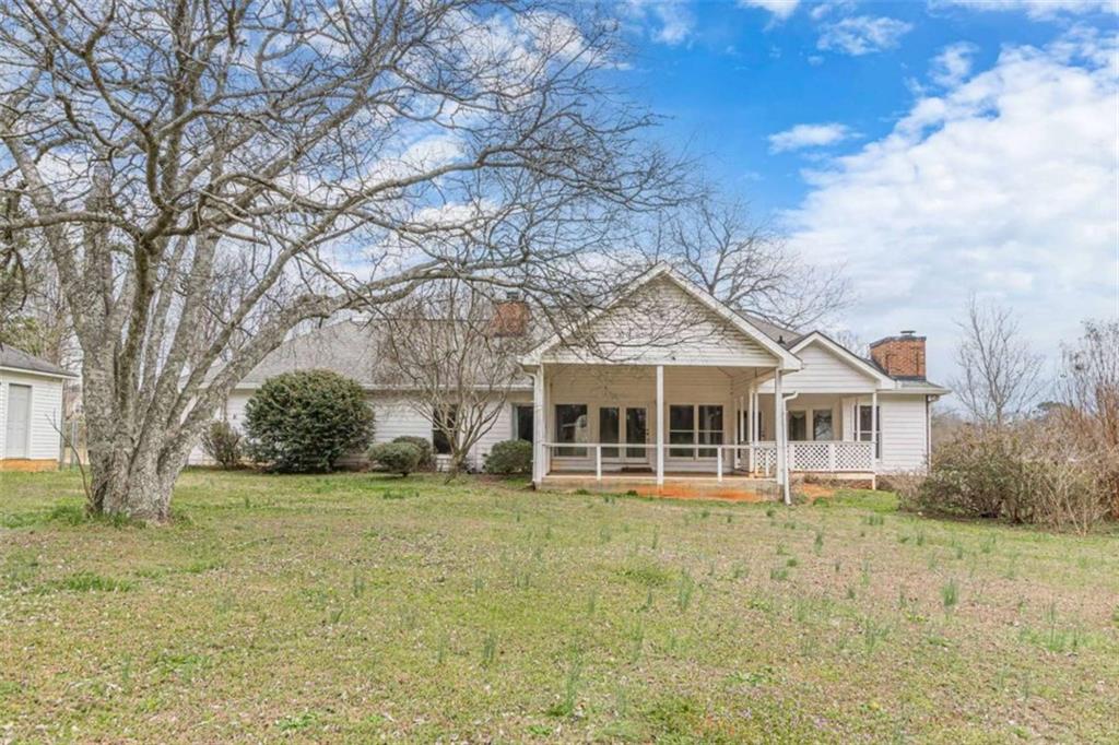 1380 Elliott Road McDonough, GA 30252 - Photo 26 of 33 a front view of a house with a garden