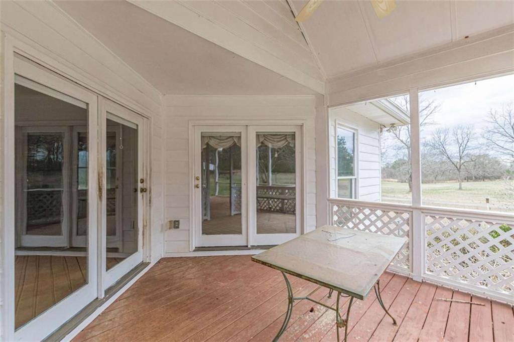 1380 Elliott Road McDonough, GA 30252 - Photo 29 of 33 a view of a room with a large window and wooden floor