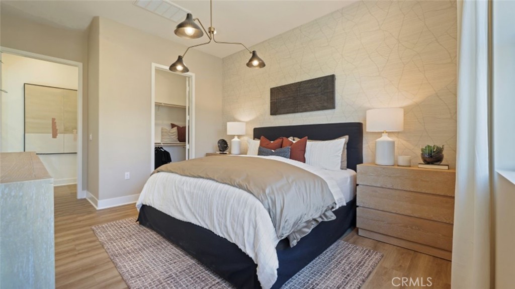 300 Junco Irvine, CA 92618 - Photo 11 of 34 a bedroom with a bed and a night stand