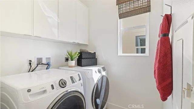 a view of kitchen and washer and dryer