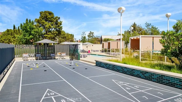 a view of swimming pool with couch