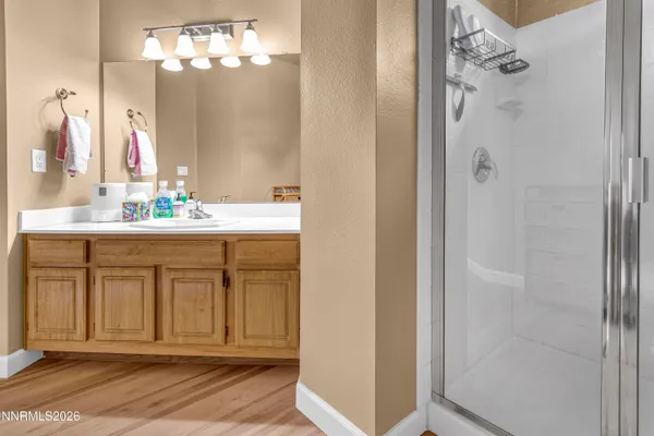 a dining room with furniture and a window