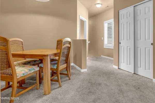a view of storage and utility room with washer and dryer