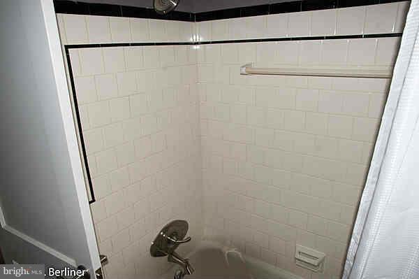 8121 Old Philadelphia Road Baltimore, MD 21237 - Photo 12 of 22 a bathroom with a shower