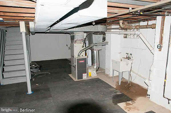 8121 Old Philadelphia Road Baltimore, MD 21237 - Photo 21 of 22 a view of a room with wooden floor