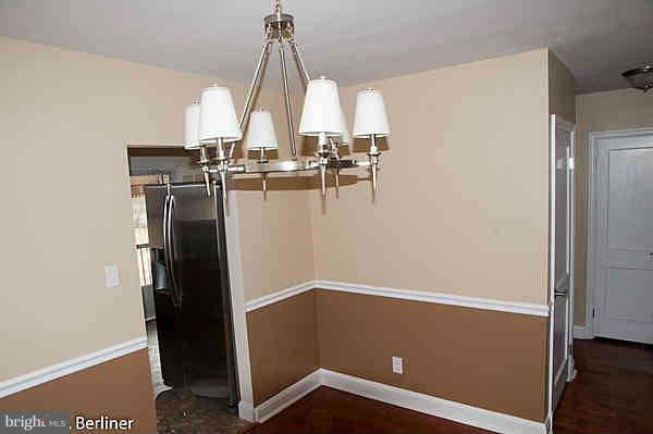 8121 Old Philadelphia Road Baltimore, MD 21237 - Photo 7 of 22 a view of a room with gym equipment