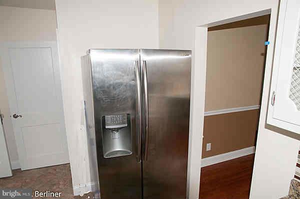 8121 Old Philadelphia Road Baltimore, MD 21237 - Photo 8 of 22 a bathroom with a glass door shower