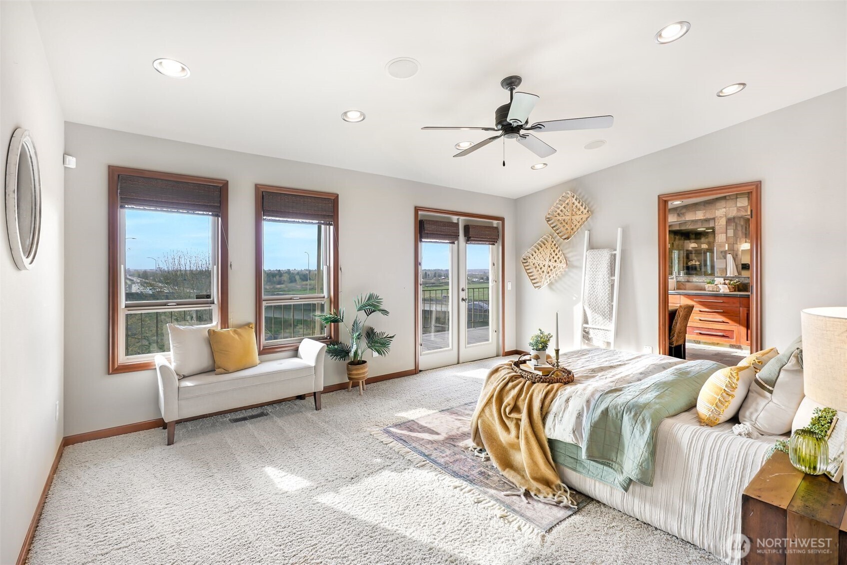 2004 Valley View Drive Lake Stevens, WA 98258 - Photo 13 of 40 a spacious bedroom with a bed and large windows