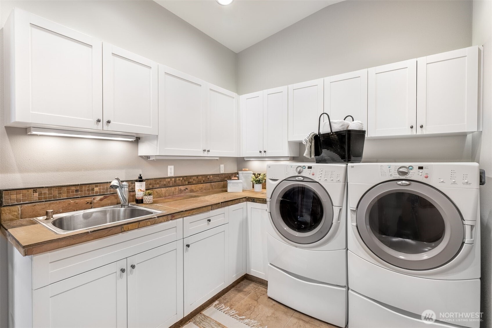 2004 Valley View Drive Lake Stevens, WA 98258 - Photo 21 of 40 a kitchen with a sink and cabinets
