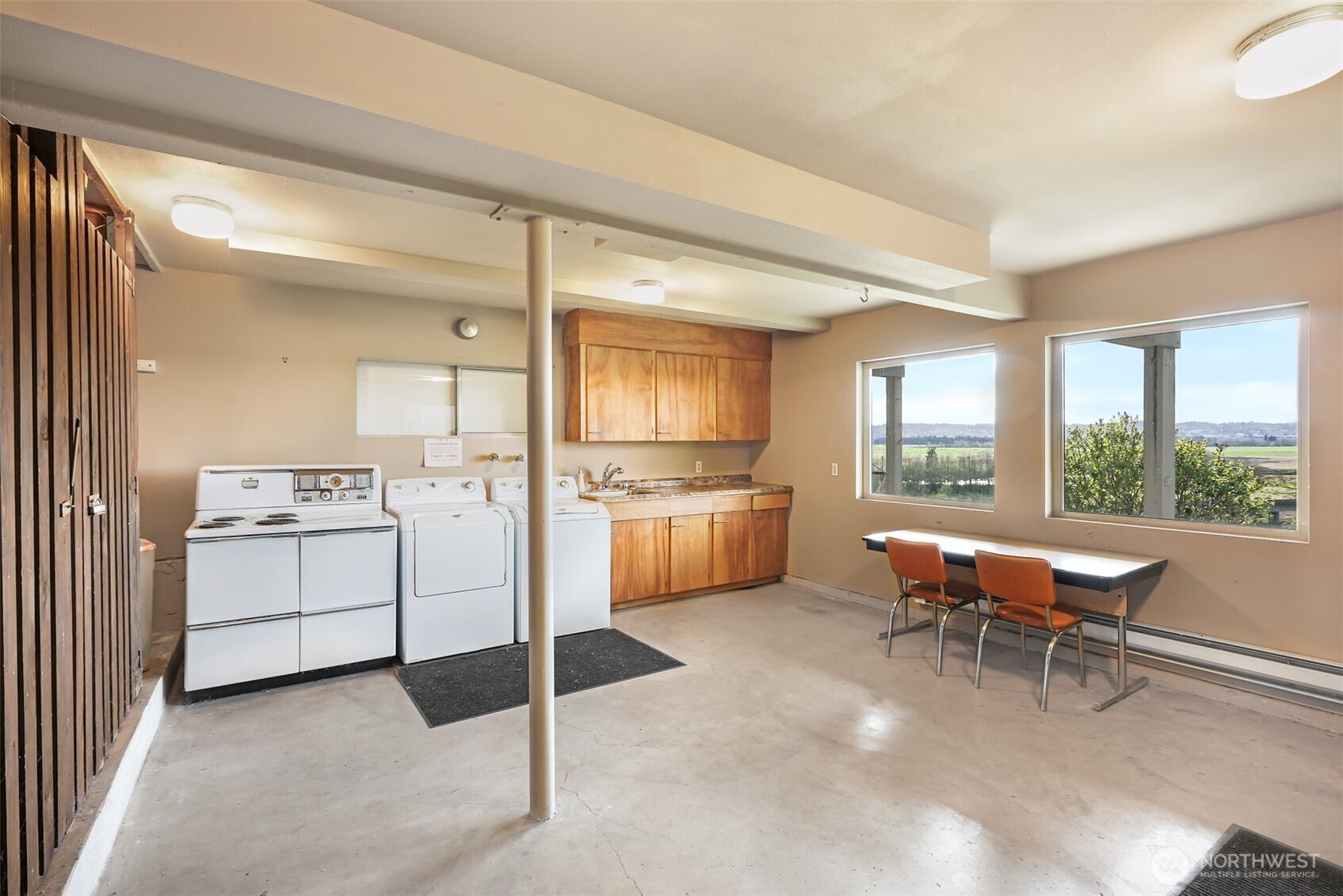 2004 Valley View Drive Lake Stevens, WA 98258 - Photo 30 of 40 a kitchen with a sink white cabinets and white appliances