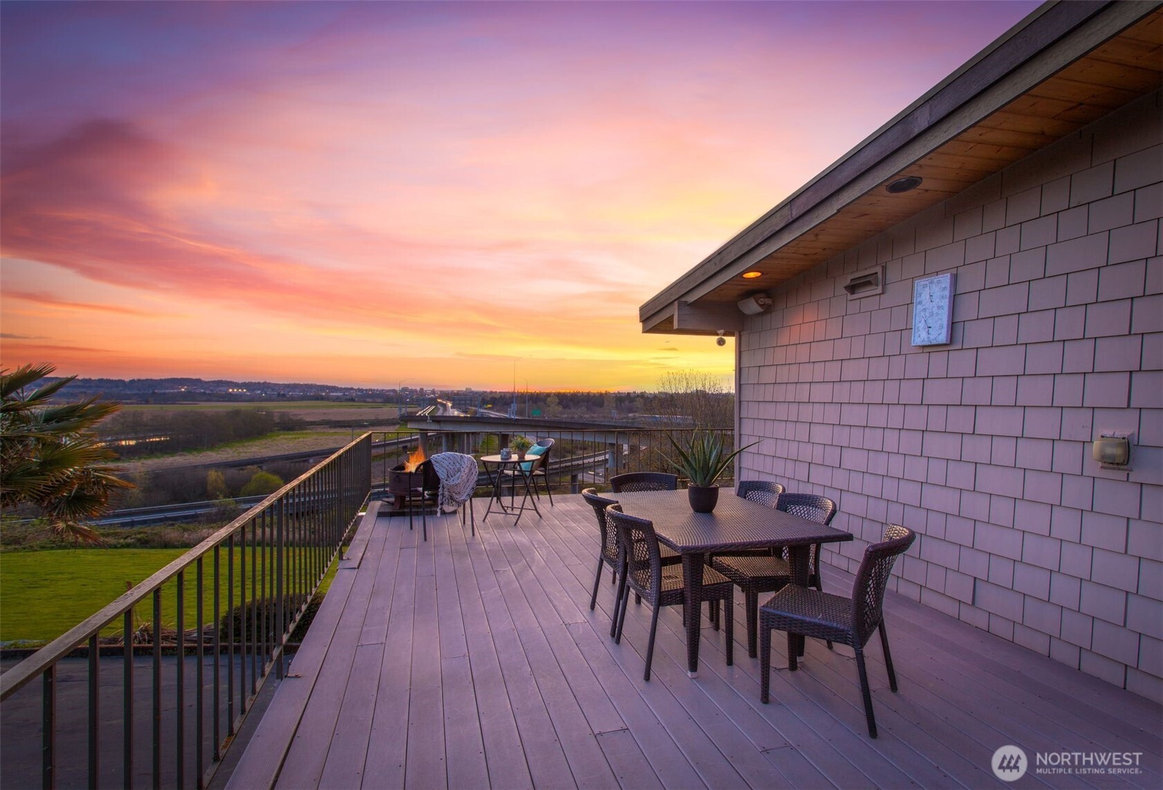 2004 Valley View Drive Lake Stevens, WA 98258 - Photo 4 of 40 a view of a roof deck with table and chairs a barbeque with wooden floor and fence